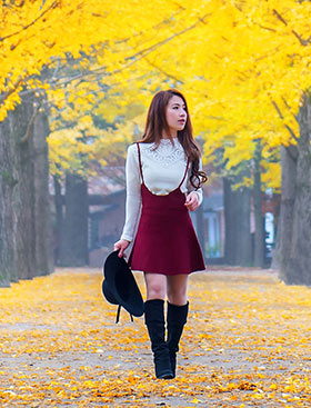 Korean girl on campus in the fall